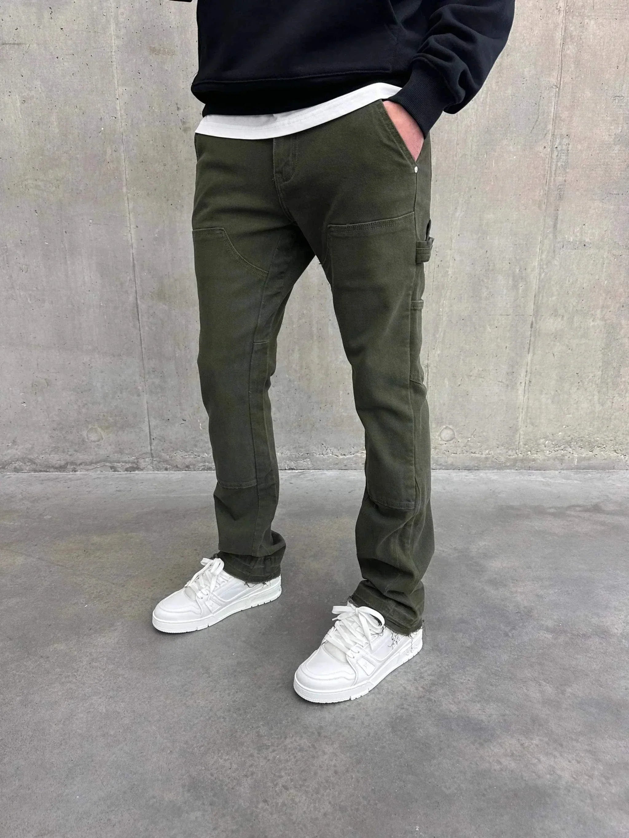 Green Siarr Rio Jeans with straight leg fit and washed detailing, featuring 8 pockets and side loop.