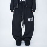 Suavo World Smiley Sweatpants in black featuring logo design.