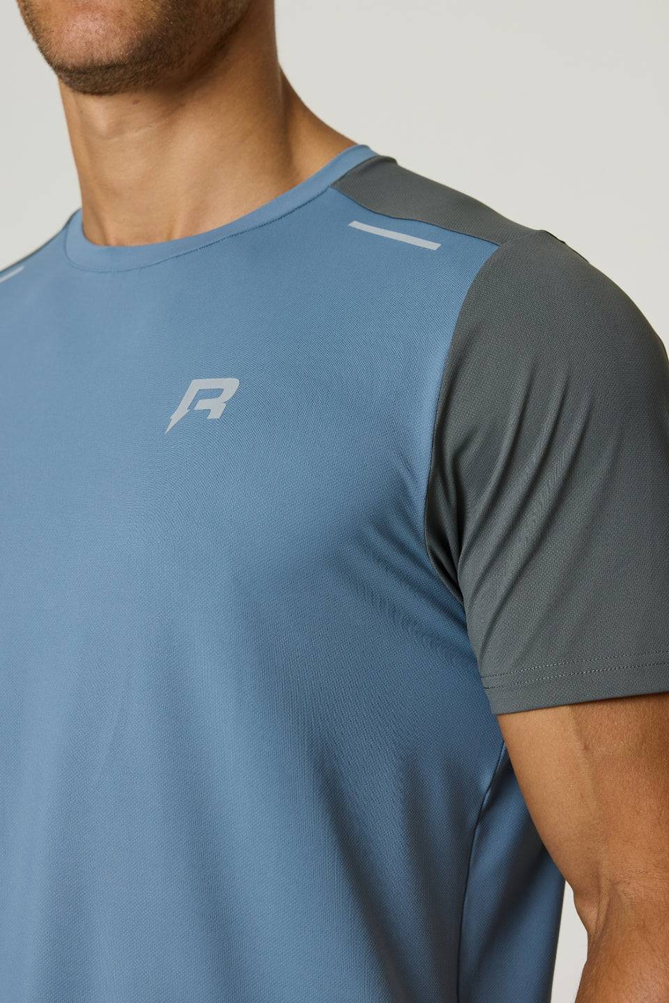 Men's Reprimo Flight T-Shirt in Air Force Blue and Gunmetal with athletic fit and reflective strip for visibility