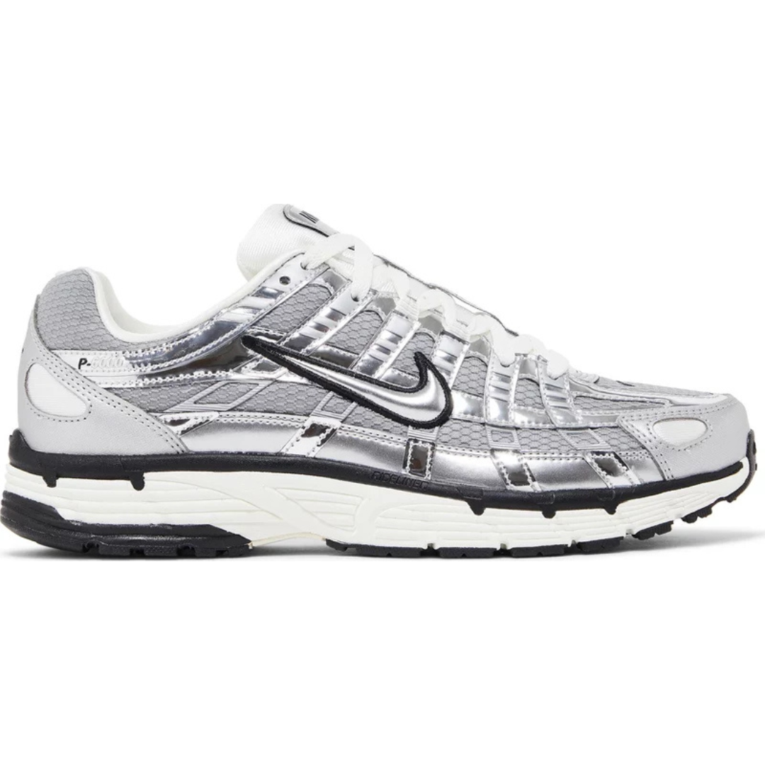 Nike P-6000 Metallic Silver sneaker with signature swoosh design.