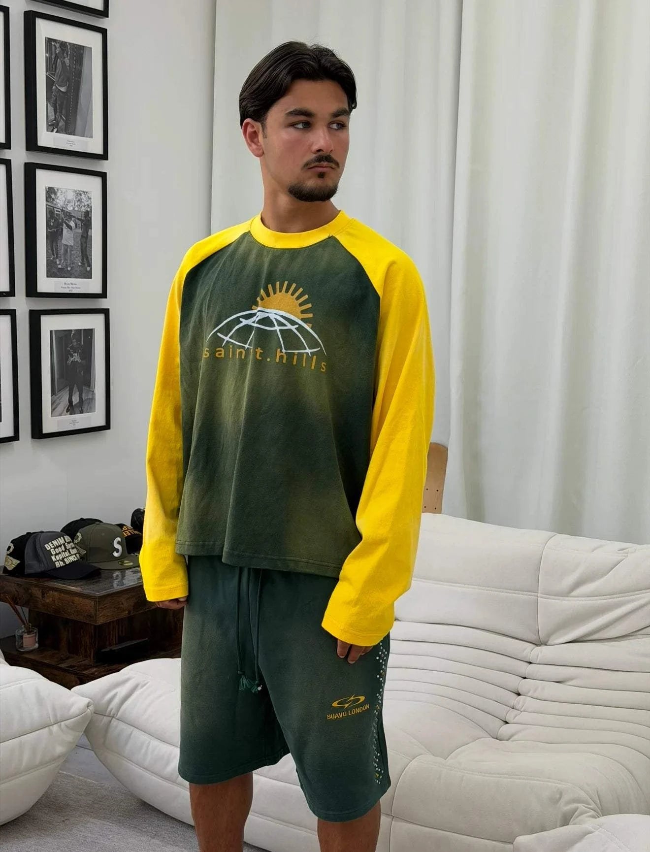 Saint Hills College long sleeve green raglan shirt with yellow sleeves and globe sun graphic