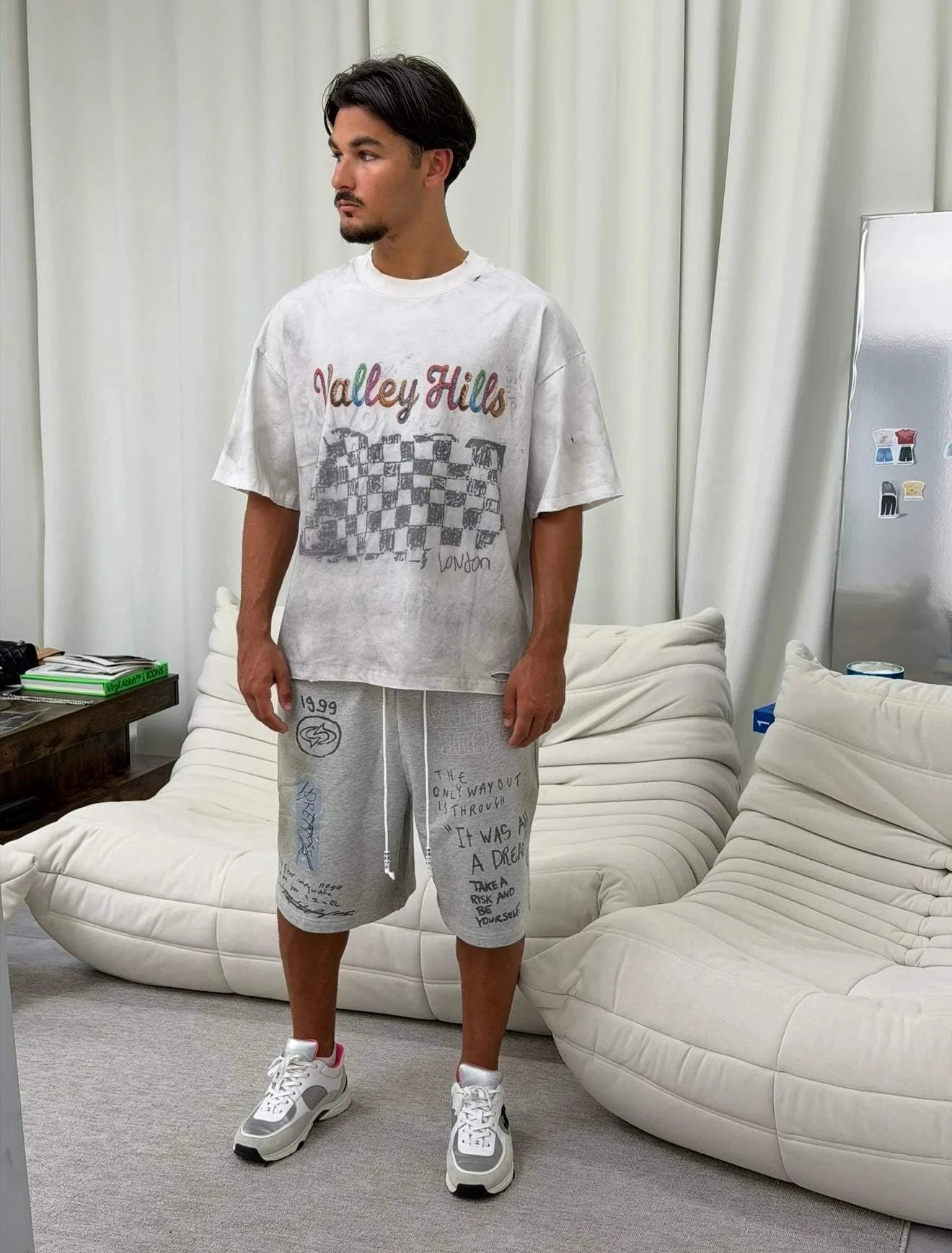White Suavo World Valley Hills T-Shirt with distressed finish and multicolored checkerboard graphic