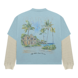 Suavo World Resort layered t-shirt with muted blue short sleeves and tropical Saint Valley graphic on back