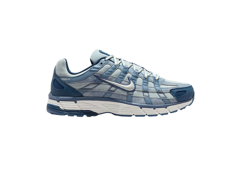 Nike P-6000 SE worn blue denim sneaker with white sole and laces