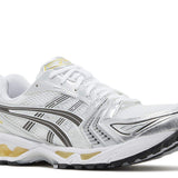 White and yellow Gel Kayano 14 running shoe side view
