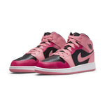 Air Jordan 1 Mid Coral Chalk (GS) sneakers in coral, black, and white, showcasing the iconic mid-top design.