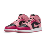 Air Jordan 1 Mid Coral Chalk (GS) sneakers in coral, black, and white, showcasing the iconic mid-top design.