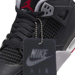 Air Jordan 4 Retro Bred Reimagined GS leather mesh upper with black and red tones.
