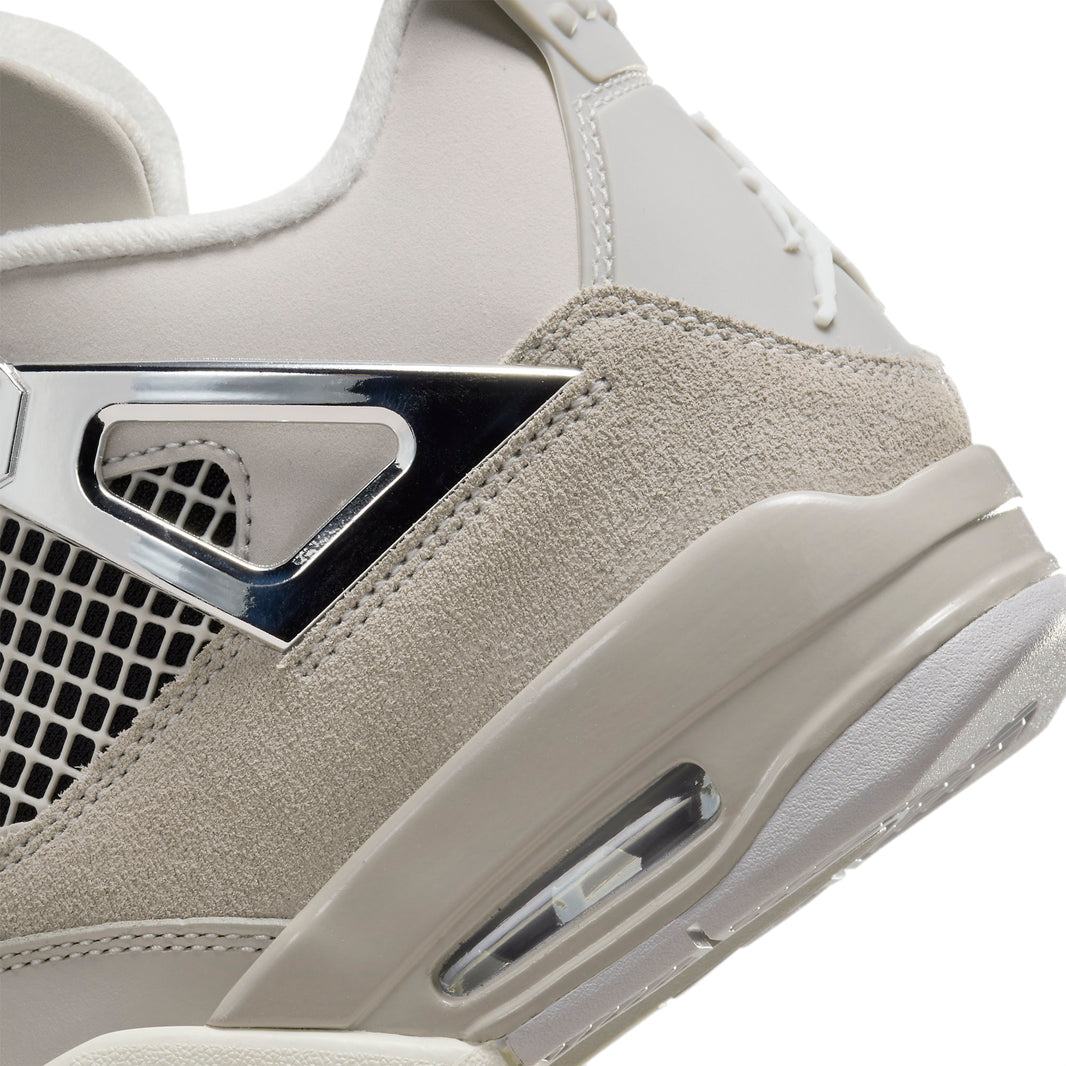 Air Jordan 4 Retro Frozen Moments (W) sneaker in icy silver and muted grey tones with premium leather and suede.