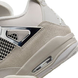 Air Jordan 4 Retro Frozen Moments (W) sneaker in icy silver and muted grey tones with premium leather and suede.