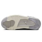 Air Jordan 4 Retro Frozen Moments outsole with grey and silver tones.