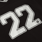 Broken Planet Market black silver football jersey with number 22.