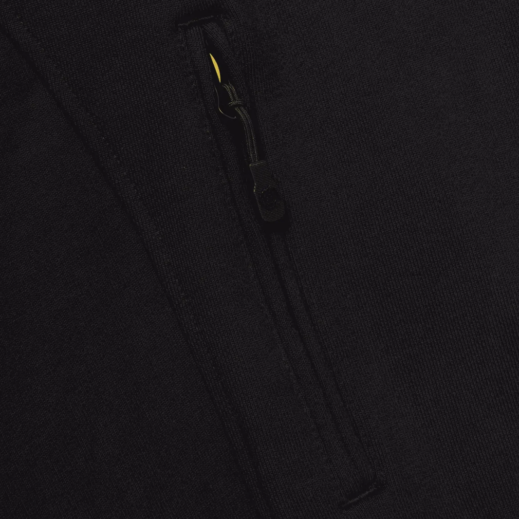 BROKEN PLANET MARKET Cosmic Speed Hoodie zip detail in black fabric.