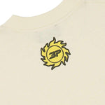 BROKEN PLANET MARKET Foot on the Gas T-shirt in vanilla white with sun logo.