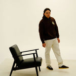 Cherry Location Brown Hoodie front view on white background