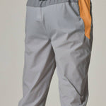 Reprimo Flight Pants in grey with orange accents.