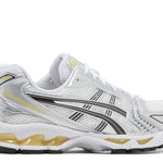 Gel Kayano 14 running shoe in white with Tai-Chi yellow accents