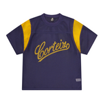 Corteiz Open Mesh navy and yellow panel jersey with bold logo text, breathable fabric.