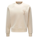 Cream AMI Paris sweatshirt with Ami De Coeur patch on chest