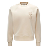 Cream AMI Paris sweatshirt with Ami De Coeur patch on chest