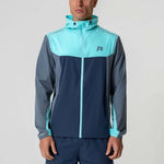 Reprimo Flight Windbreaker in cyan and navy with hood.