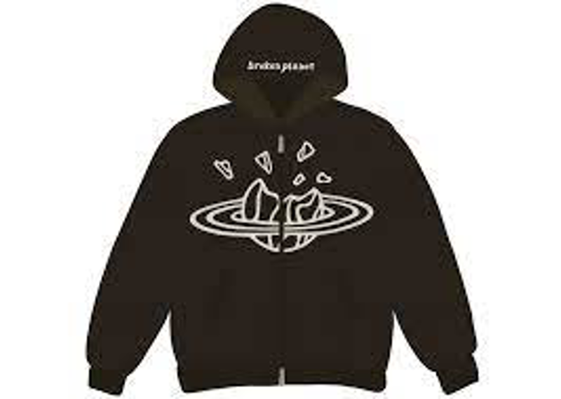 BROKEN PLANET MARKET dark grey zip-up hoodie with graphic design.
