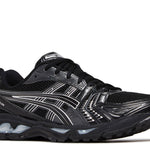 Gel Kayano 14 black running shoe with pure silver accents and mesh upper