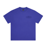 Corteiz Island Knockout Tee in indigo blue displayed on a model