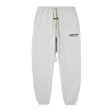 Fear of God Essentials heather grey fleece sweatpants with elastic waistband and cuffs