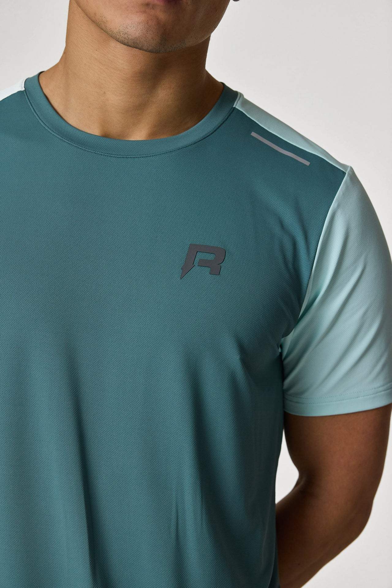 Reprimo Flight T-Shirt in Forest Green and Mint featuring logo.