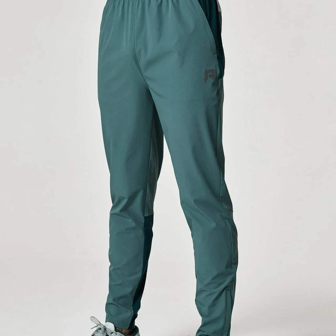 Reprimo Flight Pants in forest green and mint.