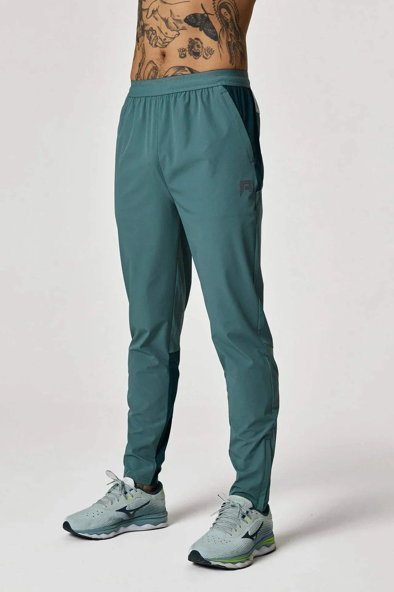 Reprimo Flight Pants in forest green and mint.