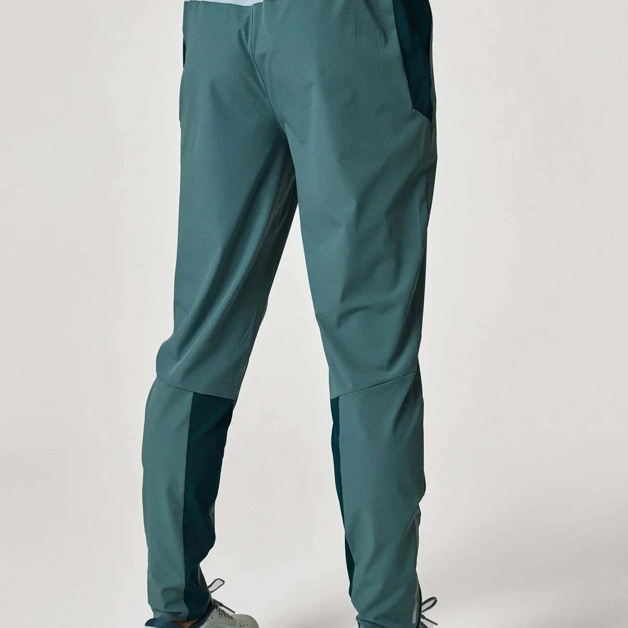 Reprimo Flight Pants in Forest Green and Mint worn from the back.