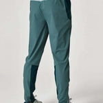 Reprimo Flight Pants in Forest Green and Mint worn from the back.
