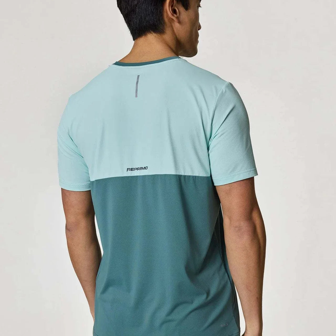 Reprimo Flight T-Shirt in Forest Green and Mint, back view.