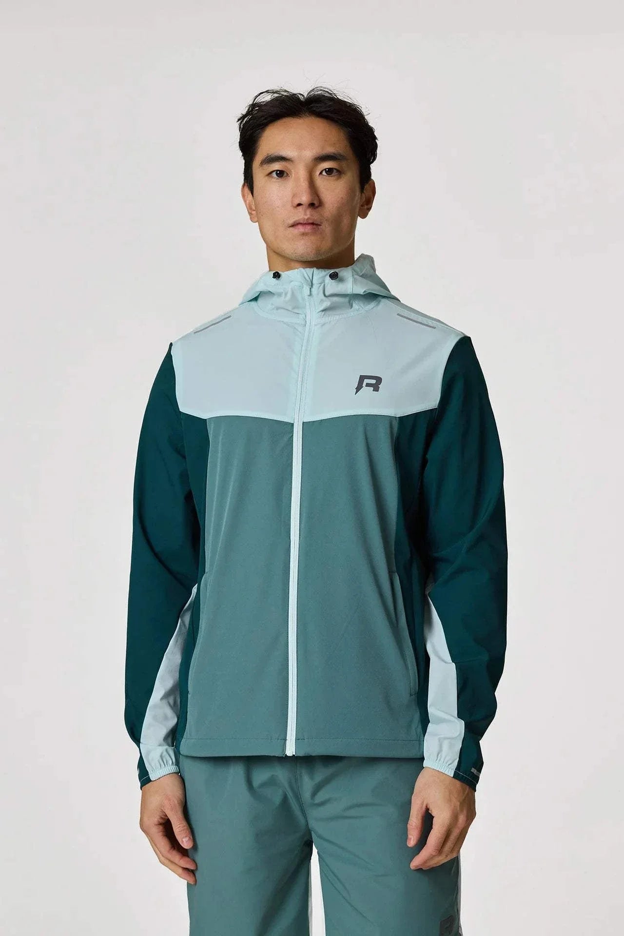 Reprimo Flight Windbreaker in Forest Green and Mint.