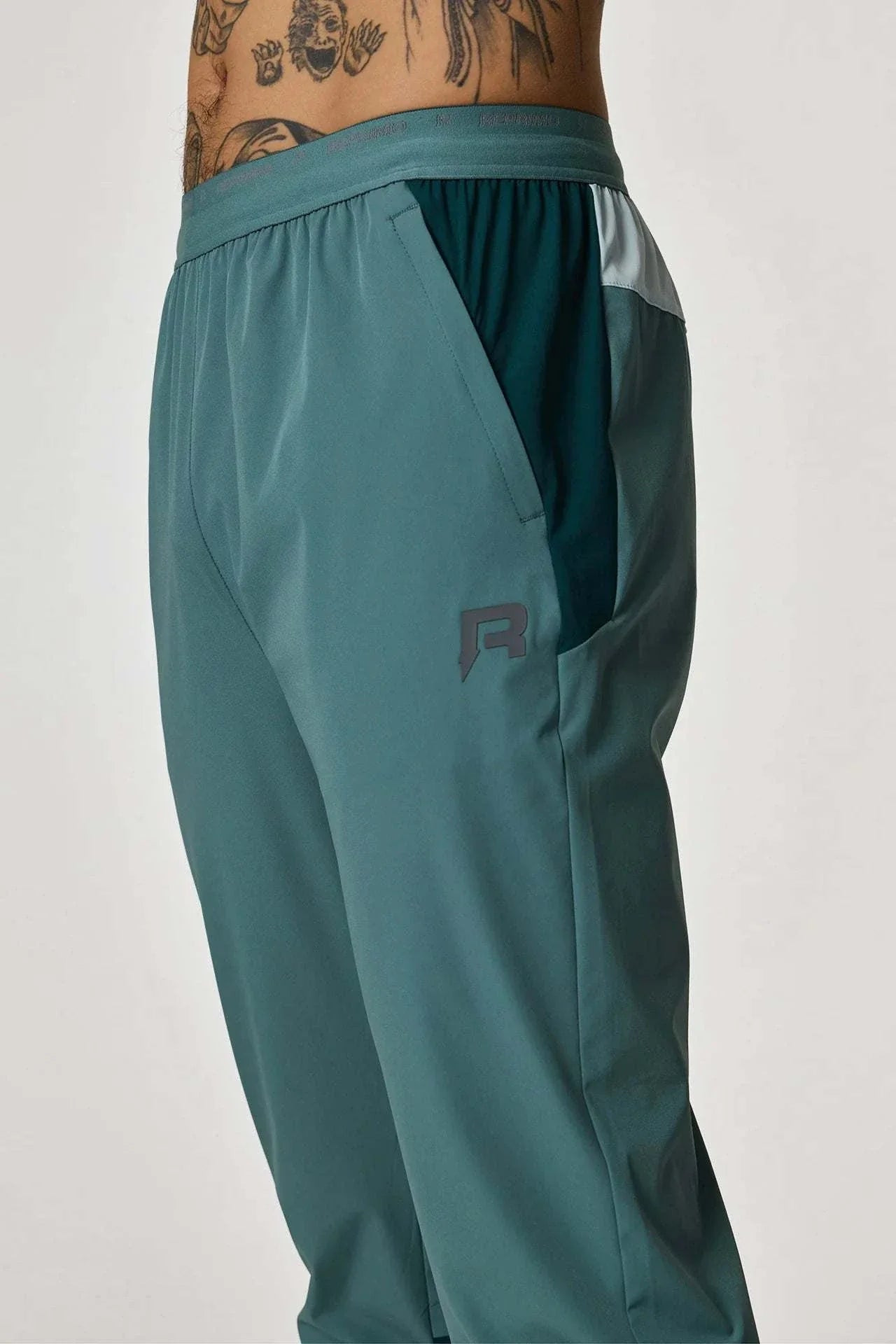 Reprimo Flight Pants in Forest Green and Mint color.
