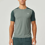 Reprimo Flight T-Shirt in hunter green with botanical accents, lightweight breathable athletic fit for high-intensity workouts, featuring reflective strips for visibility.