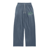 Suavo World Salt Lake City sweatpants washed blue with bold green 3D BLVD graphic and vintage faded texture