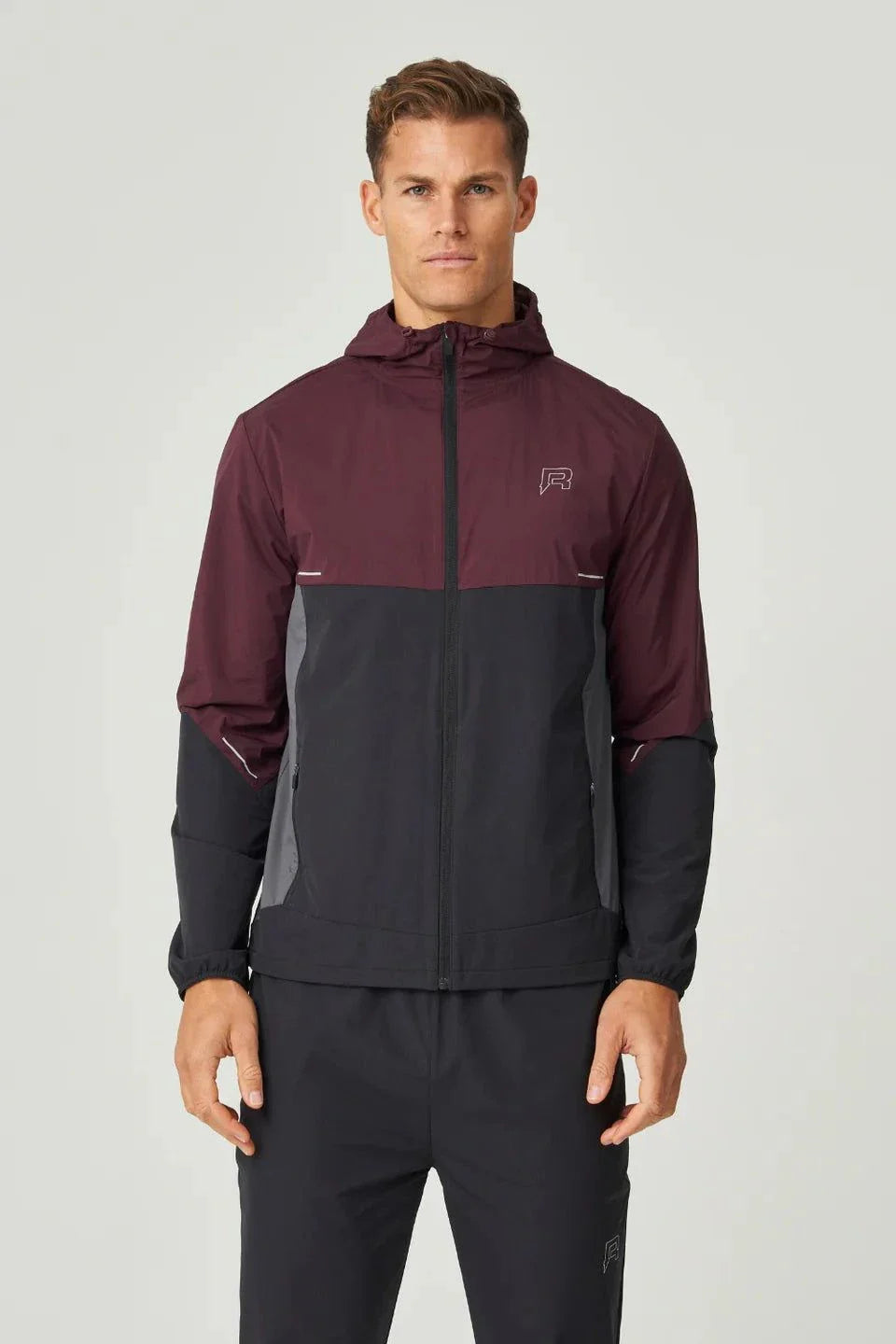 Reprimo Impact Windbreaker men's lightweight burgundy and obsidian jacket with hood and contrast color blocking