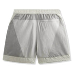 Kith Washed Nylon Turbo Short Pacify SS26 in blue and white color blocking