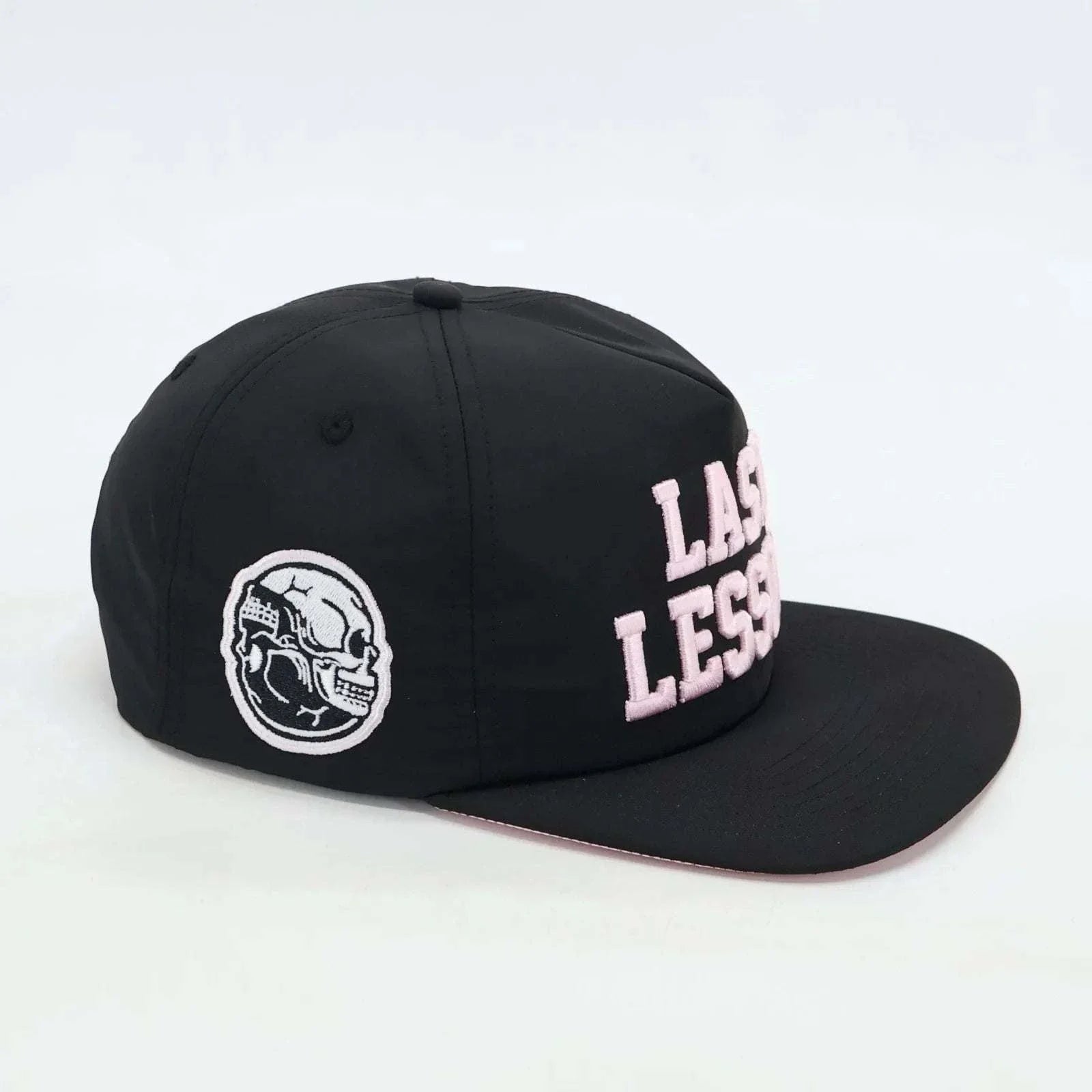 Black Last Lesson SnapBack Hat with embroidery design.