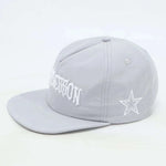 Grey Last Lesson SnapBack hat with embroidered star design.