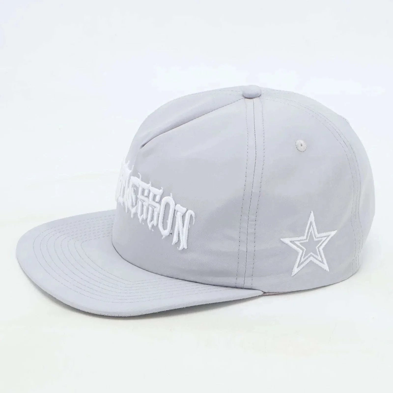 Grey Last Lesson SnapBack hat with embroidered star design.