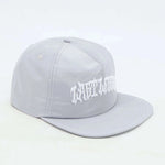 Last Lesson SnapBack Hat in Grey with embroidered logo.