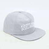 Last Lesson SnapBack Hat in Grey with embroidered logo.