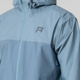Reprimo Nova Jacket in Aqua and Dusk Blue with hood.