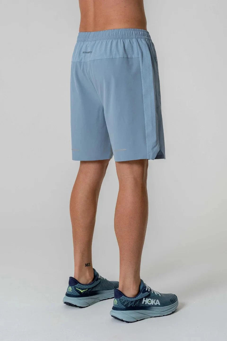 Reprimo Nova Shorts in Aqua and Dusk Blue, back view.