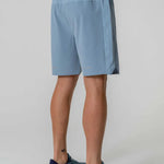 Reprimo Nova Shorts in Aqua and Dusk Blue, back view.