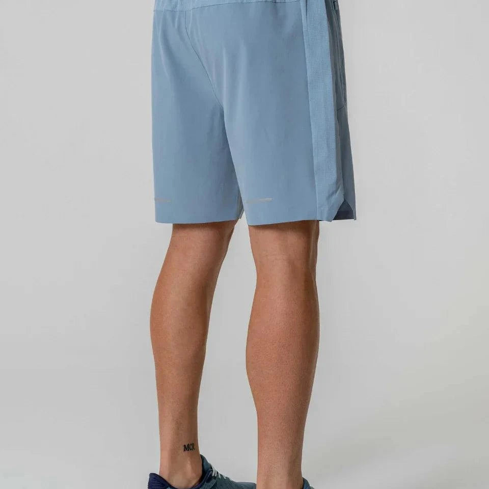 Reprimo Nova Shorts in Aqua and Dusk Blue, back view.